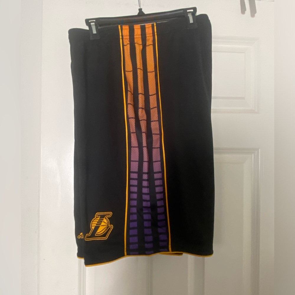 Adidas Black shorts with Purple and Gold Stripes